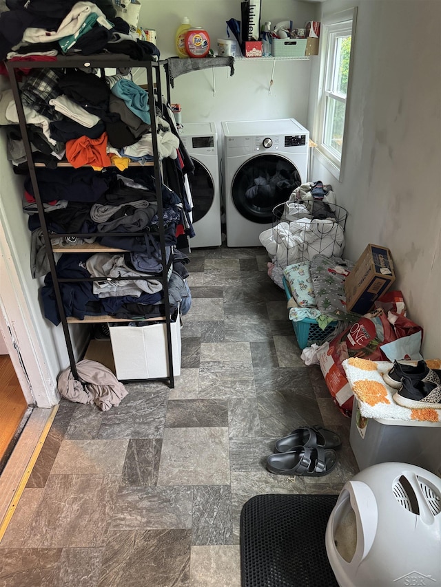 227 Mckinley Rd, Flushing, MI 48433 - washroom with washing machine and clothes dryer and stone finish floors