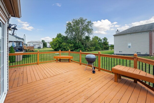6819 Lakeway St, Ypsilanti, MI 48197 - deck featuring a yard and a grill