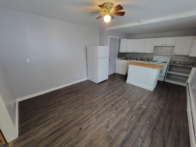 214 Arthur St, Manistee, MI 49660 - kitchen featuring white appliances, wooden counters, decorative backsplash, and dark wood-style flooring