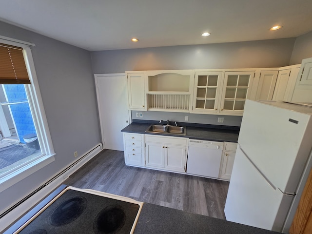214 Arthur St, Manistee, MI 49660 - kitchen with white appliances, a sink, dark countertops, open shelves, and recessed lighting