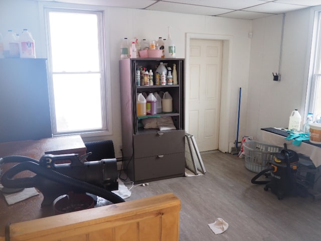 214 Arthur St, Manistee, MI 49660 - office area with light wood-style floors and a drop ceiling