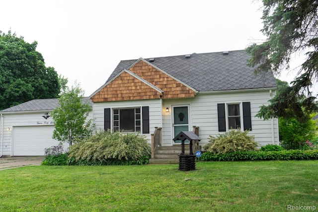 1247 Catalina Dr, Flint, MI 48507 - view of front facade featuring a garage, a front yard, concrete driveway, and roof with shingles