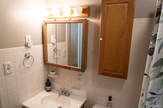 1247 Catalina Dr, Flint, MI 48507 - full bath with tile walls, vanity, and a shower with shower curtain