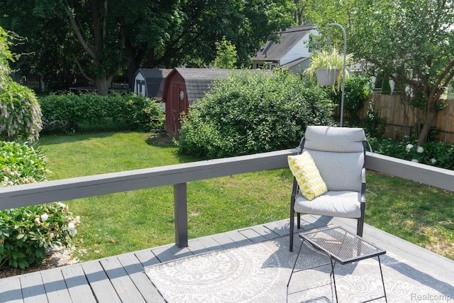 1247 Catalina Dr, Flint, MI 48507 - view of patio / terrace with a storage unit and a deck