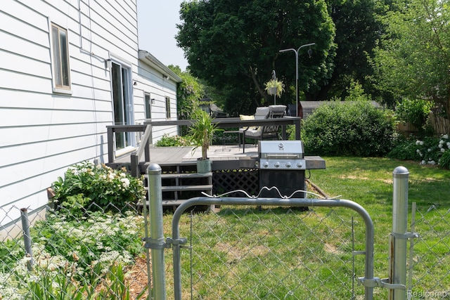 1247 Catalina Dr, Flint, MI 48507 - view of yard with a wooden deck and a gate