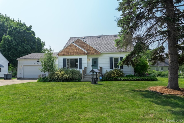 1247 Catalina Dr, Flint, MI 48507 - view of front of home featuring concrete driveway, a garage, and a front yard