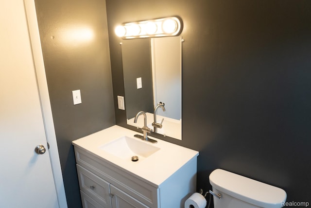 1247 Catalina Dr, Flint, MI 48507 - bathroom featuring vanity and toilet