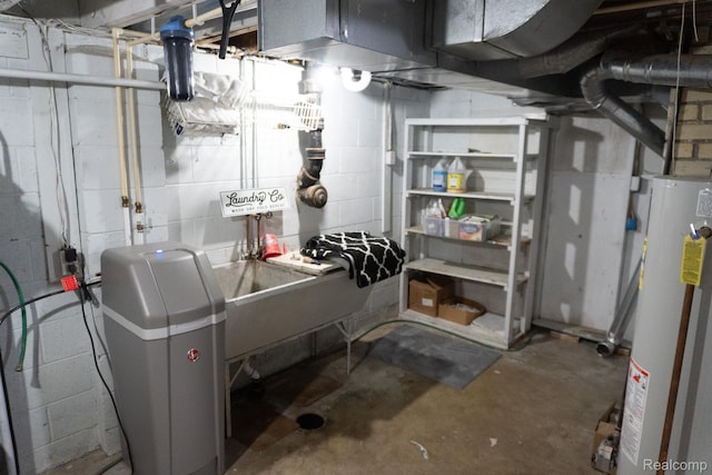 1247 Catalina Dr, Flint, MI 48507 - unfinished below grade area with water heater and a water softener