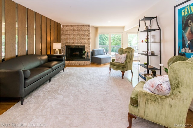 41350 Woodward Ave, Bloomfield Hills, MI 48304 - living room with wood finished floors and a brick fireplace