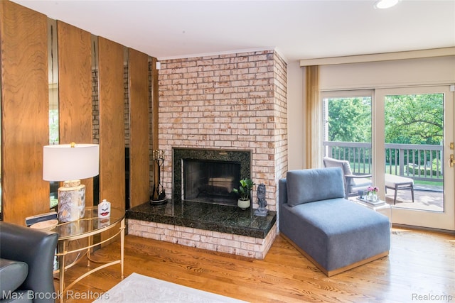 41350 Woodward Ave, Bloomfield Hills, MI 48304 - living room with wood finished floors, a fireplace, and recessed lighting