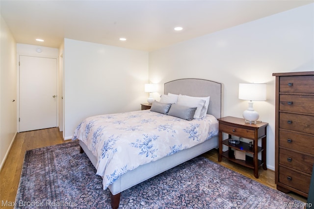 41350 Woodward Ave, Bloomfield Hills, MI 48304 - bedroom with wood finished floors, recessed lighting, and baseboards