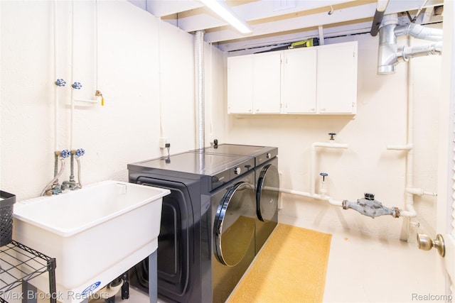 41350 Woodward Ave, Bloomfield Hills, MI 48304 - laundry area with washer and dryer and cabinet space