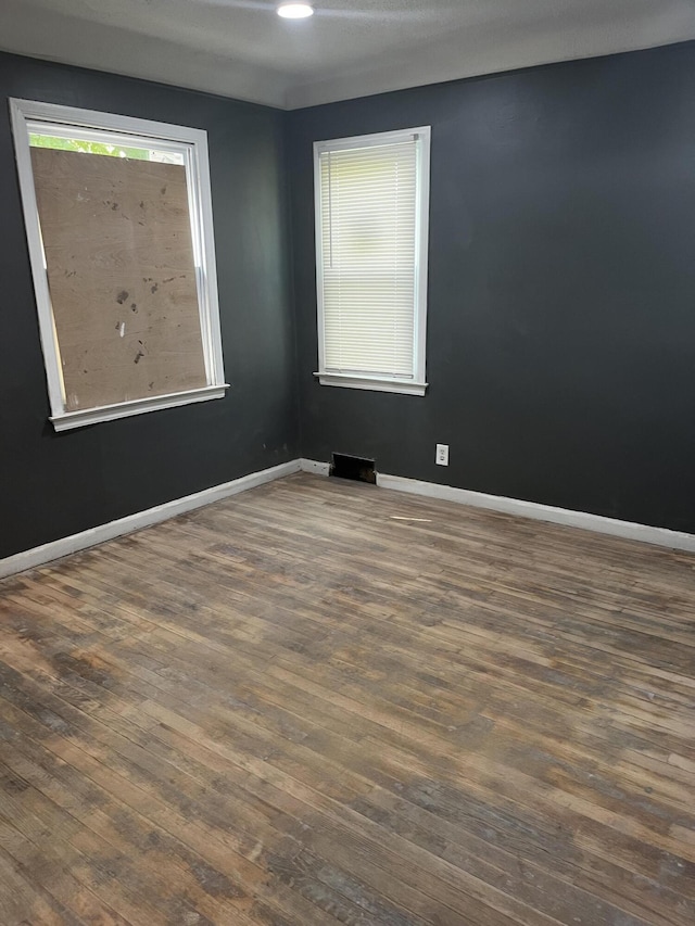 19188 Pelkey St, Detroit, MI 48205 - unfurnished room with hardwood / wood-style floors, baseboards, and recessed lighting