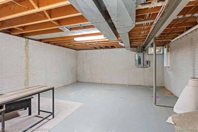 751 River Edge Ct, Flushing, MI 48433 - below grade area with electric panel and brick wall