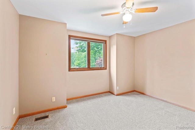751 River Edge Ct, Flushing, MI 48433 - carpeted empty room featuring ceiling fan and baseboards