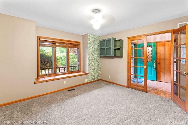 751 River Edge Ct, Flushing, MI 48433 - carpeted spare room with french doors and baseboards