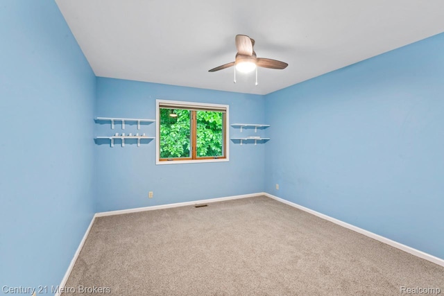 751 River Edge Ct, Flushing, MI 48433 - unfurnished room with a ceiling fan and carpet flooring