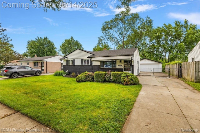 2570 Tarry Dr, Macomb, MI 48310 - view of front facade with a gate, a garage, and an outdoor structure