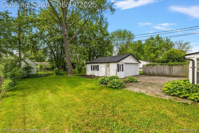 2570 Tarry Dr, Macomb, MI 48310 - view of yard with an outbuilding and a detached garage