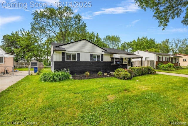 2570 Tarry Dr, Macomb, MI 48310 - view of front of home with brick siding and a gate