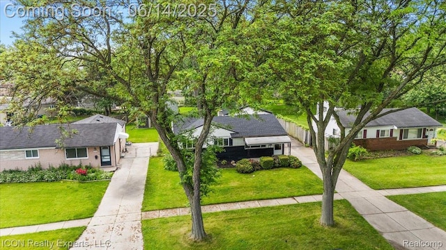 2570 Tarry Dr, Macomb, MI 48310 - view of front of home featuring driveway and brick siding
