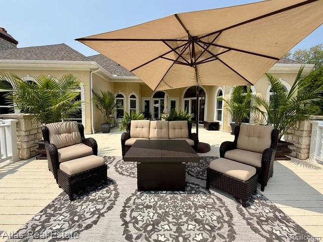 5415 Walker Rd, Davison, MI 48423 - deck featuring an outdoor hangout area