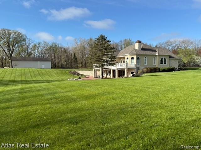 5415 Walker Rd, Davison, MI 48423 - back of house with a lawn