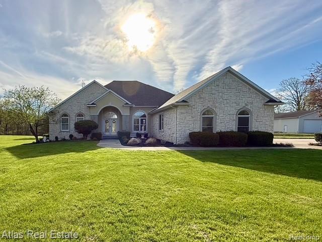 5415 Walker Rd, Davison, MI 48423 - french country style house with stone siding and a front lawn