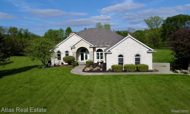 5415 Walker Rd, Davison, MI 48423 - view of front of property featuring stone siding and a front lawn