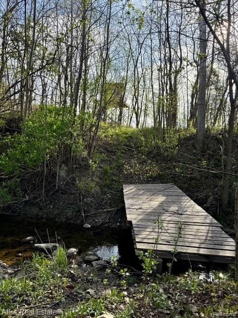 5415 Walker Rd, Davison, MI 48423 - exterior space with a dock
