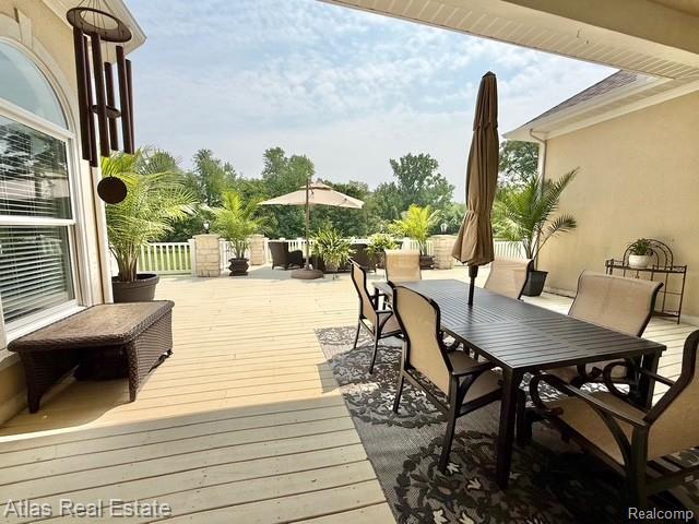 5415 Walker Rd, Davison, MI 48423 - wooden deck with outdoor dining area