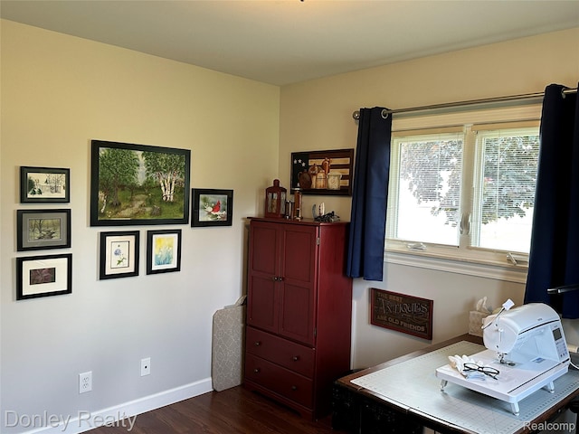250 N Decker Rd, Snover, MI 48727 - office with dark wood-style flooring and baseboards