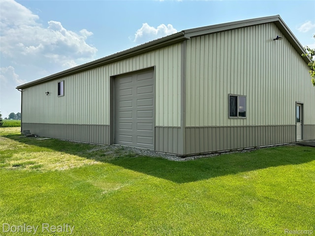 250 N Decker Rd, Snover, MI 48727 - view of property exterior featuring an outbuilding and a lawn