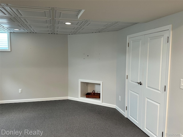 250 N Decker Rd, Snover, MI 48727 - below grade area featuring baseboards, dark carpet, and recessed lighting