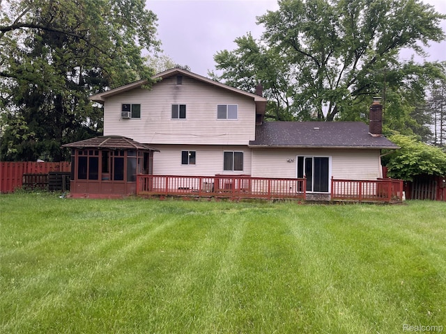 7040 Banks, Waterford, MI 48327 - back of property featuring a chimney, a gazebo, and a wooden deck