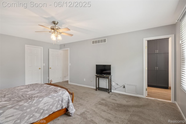 11213 Youngstree Ct, Davisburg, MI 48350 - bedroom with carpet, baseboards, and ceiling fan