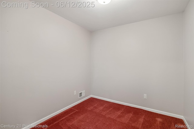 11213 Youngstree Ct, Davisburg, MI 48350 - spare room featuring baseboards and dark colored carpet