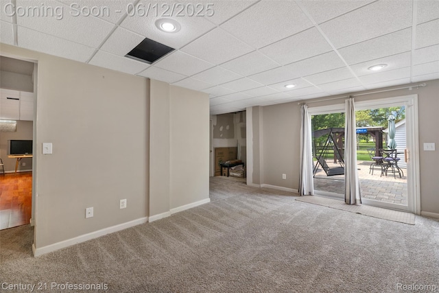 11213 Youngstree Ct, Davisburg, MI 48350 - carpeted spare room with a drop ceiling, baseboards, and recessed lighting