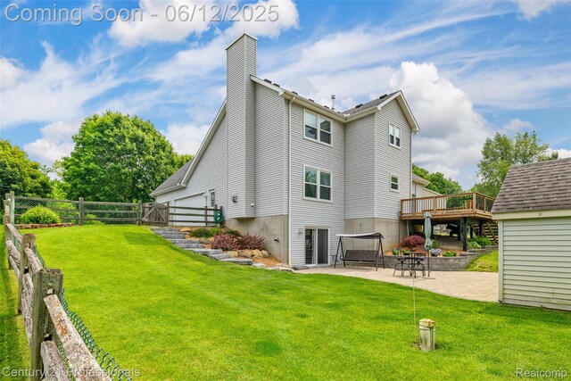 11213 Youngstree Ct, Davisburg, MI 48350 - rear view of property featuring a patio area, a chimney, and a wooden deck