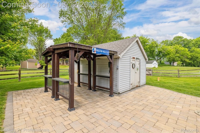11213 Youngstree Ct, Davisburg, MI 48350 - view of patio / terrace featuring a gazebo and an outbuilding