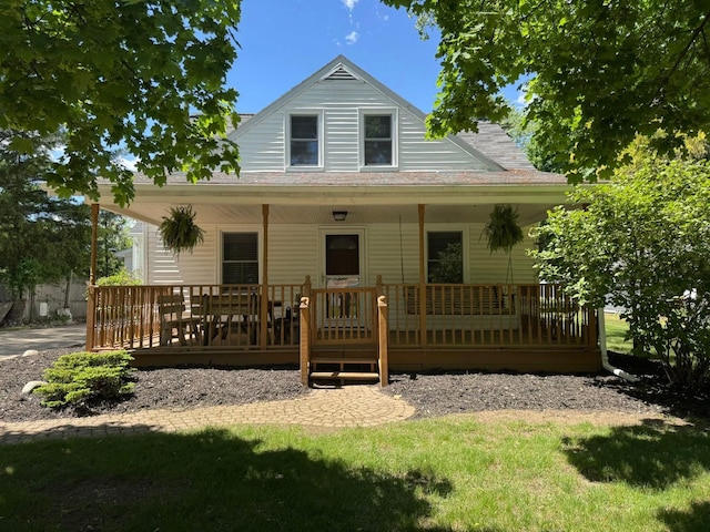 829 S Union St, Tecumseh, MI 49286 - view of front of home with covered porch and roof with shingles