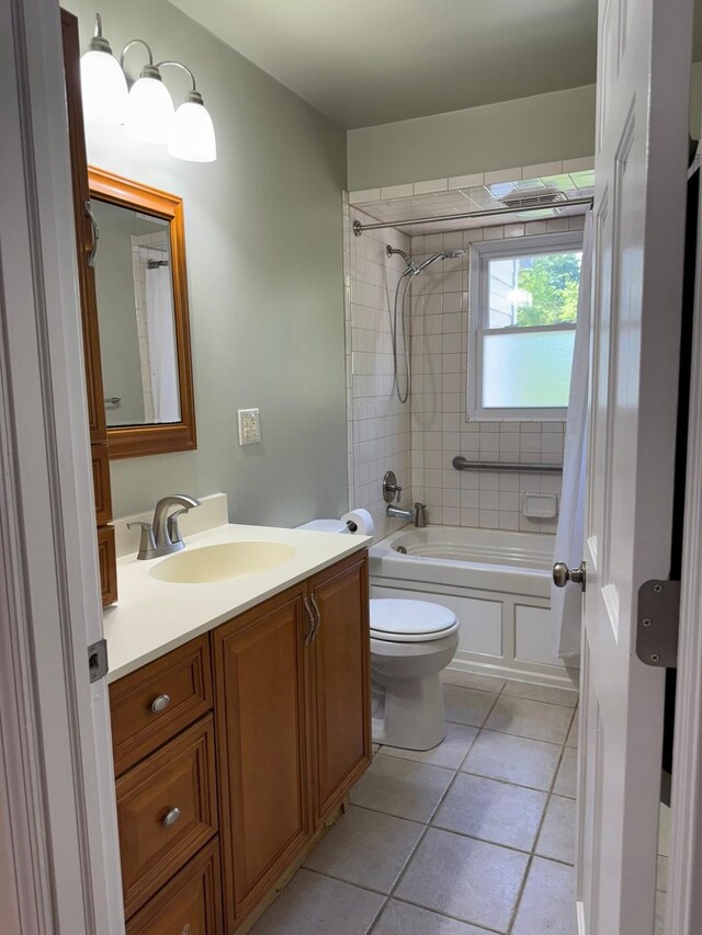 829 S Union St, Tecumseh, MI 49286 - full bathroom with vanity, toilet, shower / bath combo, and tile patterned floors