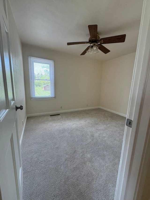 829 S Union St, Tecumseh, MI 49286 - carpeted empty room featuring a ceiling fan and baseboards