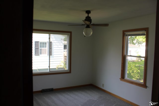 653 Huber Dr, Monroe, MI 48162 - empty room with carpet flooring and a ceiling fan
