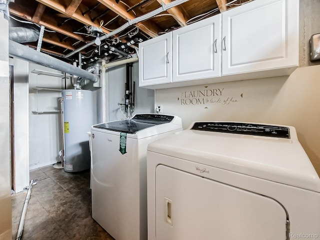 19394 Ingram Dr, Shelby Twp, MI 48038 - laundry area featuring water heater, cabinet space, and washer and clothes dryer