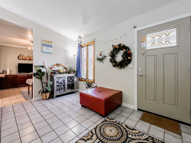 19394 Ingram Dr, Shelby Twp, MI 48038 - foyer entrance featuring light tile patterned flooring, healthy amount of natural light, crown molding, and ceiling fan