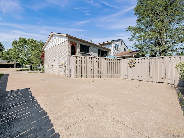 19394 Ingram Dr, Shelby Twp, MI 48038 - view of side of property with brick siding