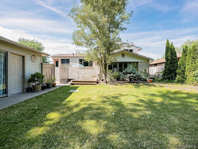 19394 Ingram Dr, Shelby Twp, MI 48038 - view of yard featuring a deck