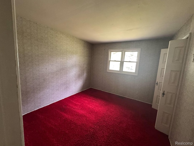 1396 Westerrace Dr, Flint, MI 48532 - unfurnished room with dark carpet