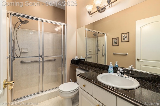 50021 Ludwig Ct, Shelby Twp, MI 48317 - bathroom with a shower stall, toilet, and vanity